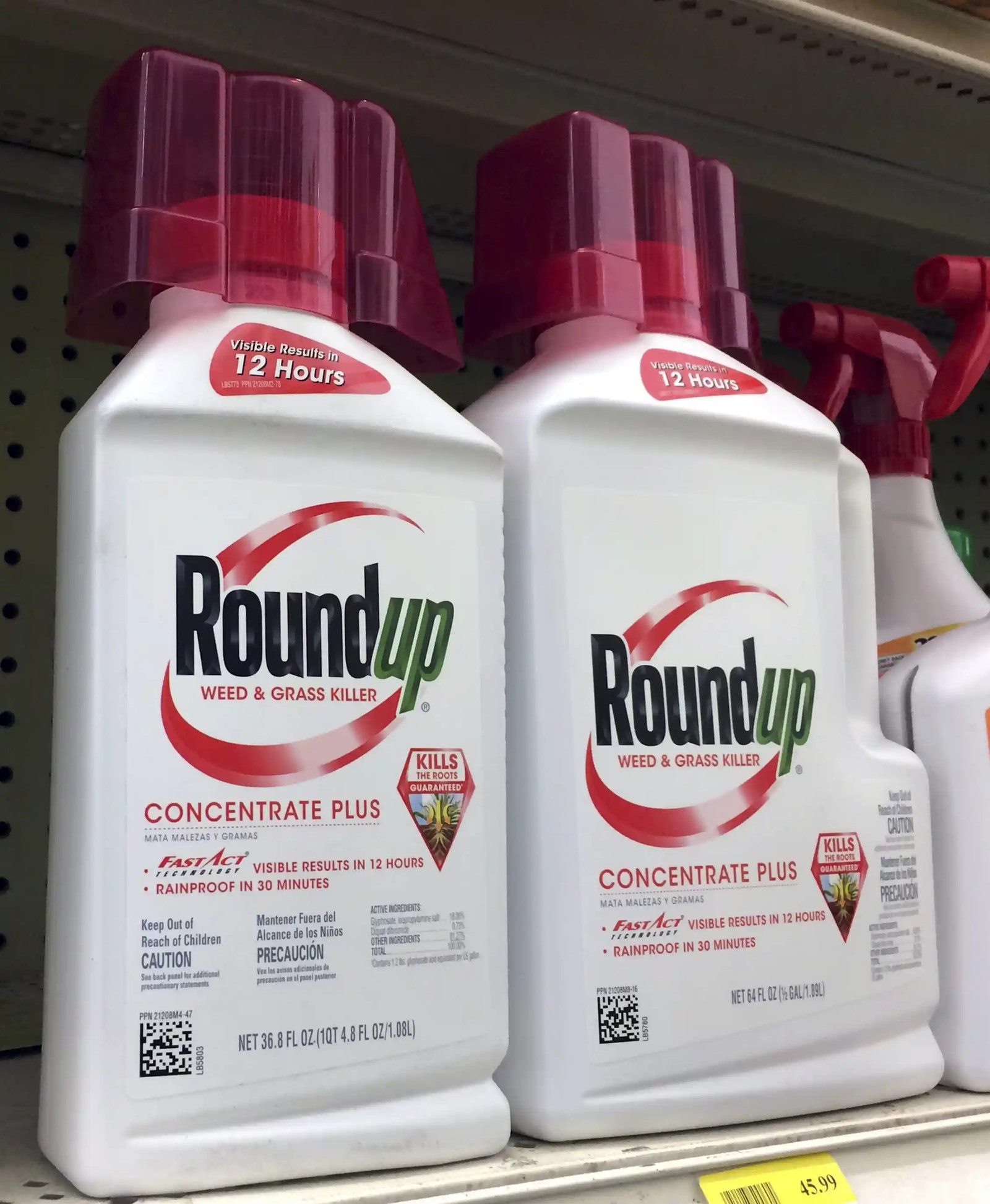 containers of roundup on a store shelf