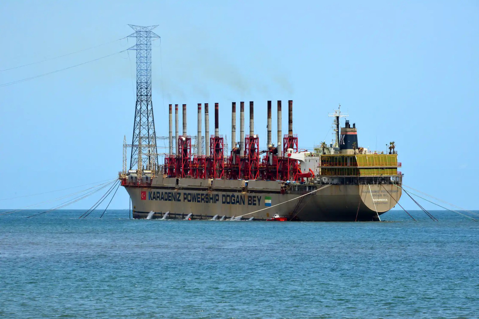 A large ship surrounded by ocean.