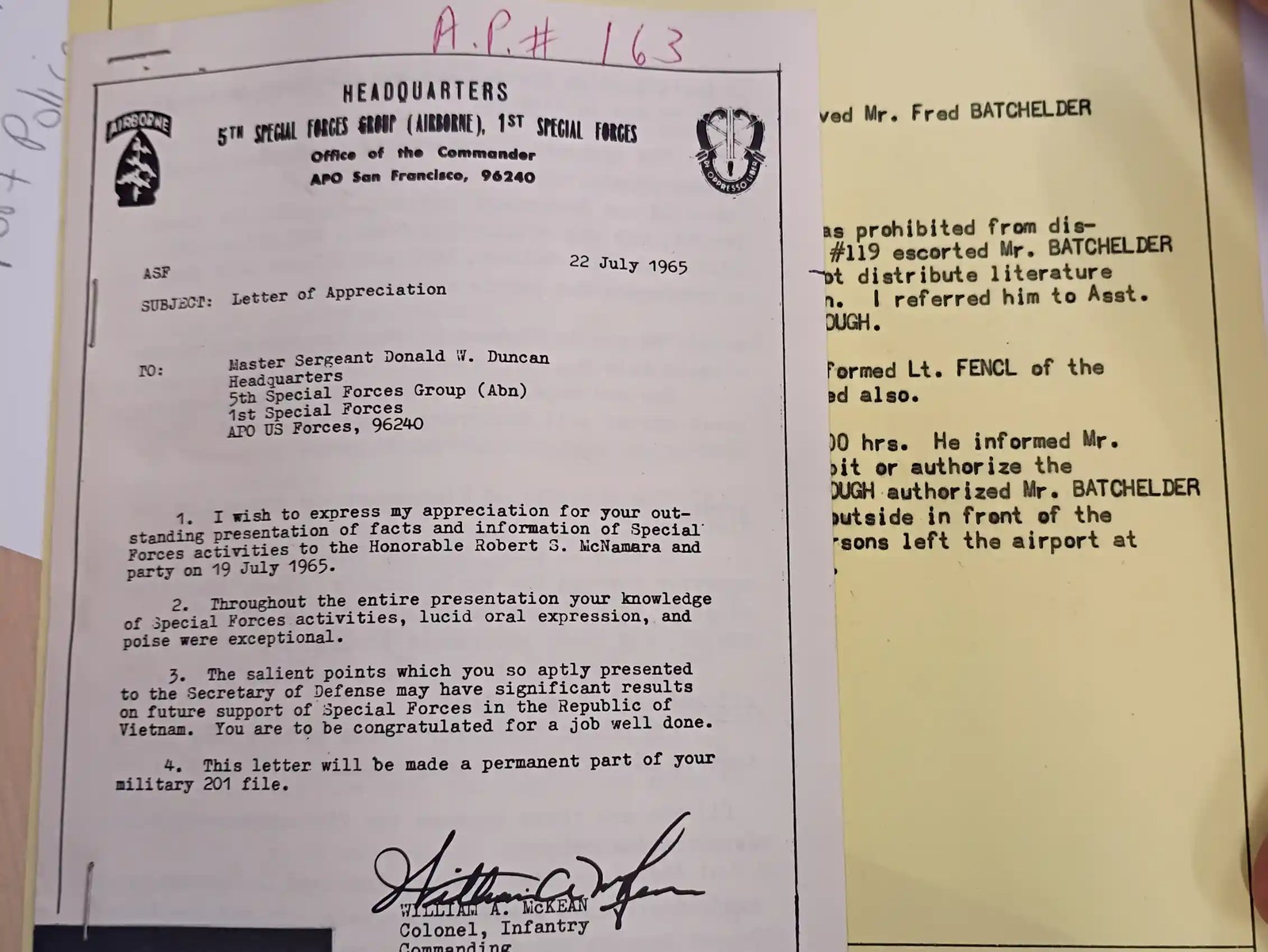 A yellow paper with typewritten notes and a white paper that says 'Master Sgt. Duncan Tells the Truth' attached on top