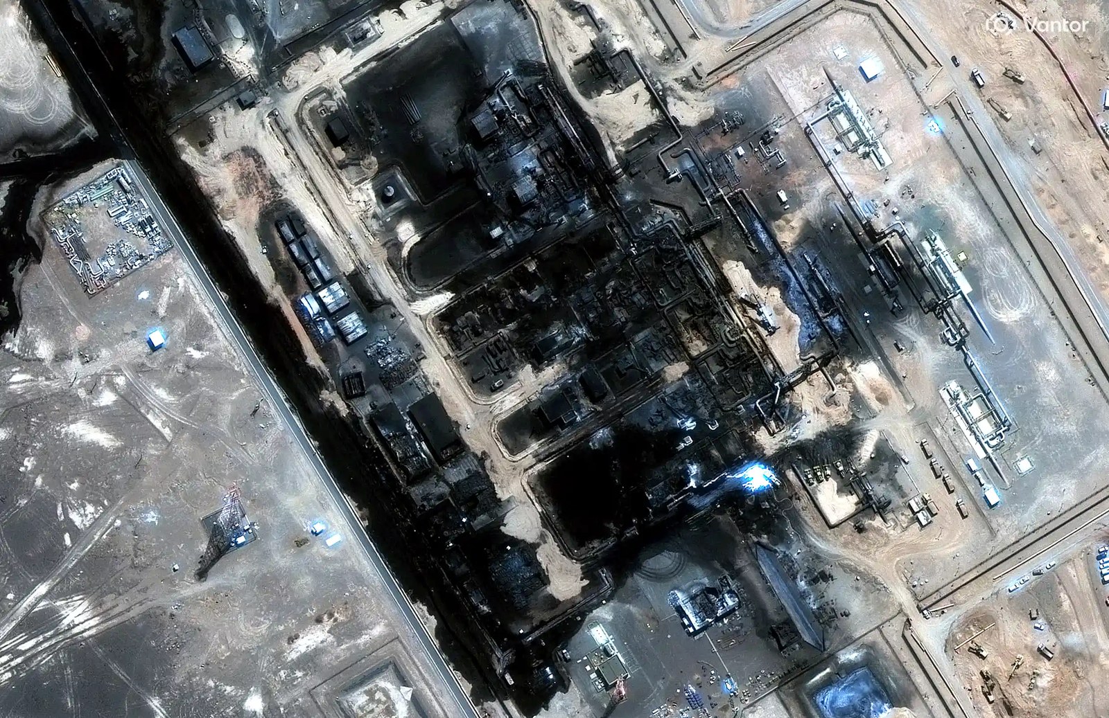 satellite view of blackened oil pipeline.