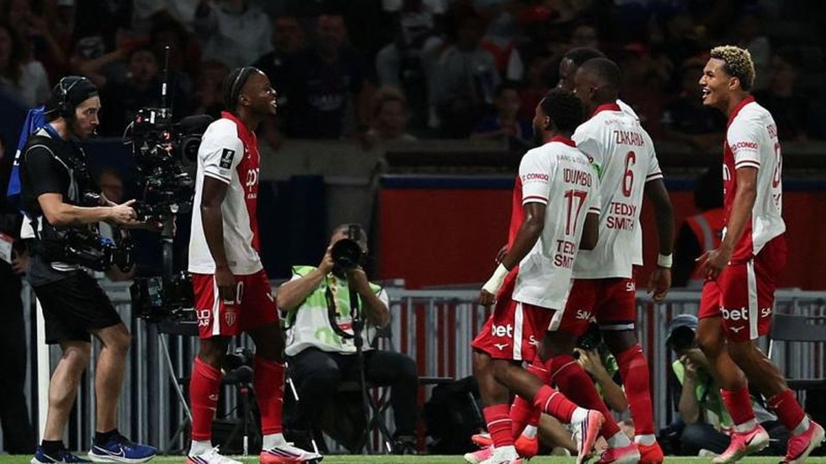 Monaco players celebrate scoring against PSG