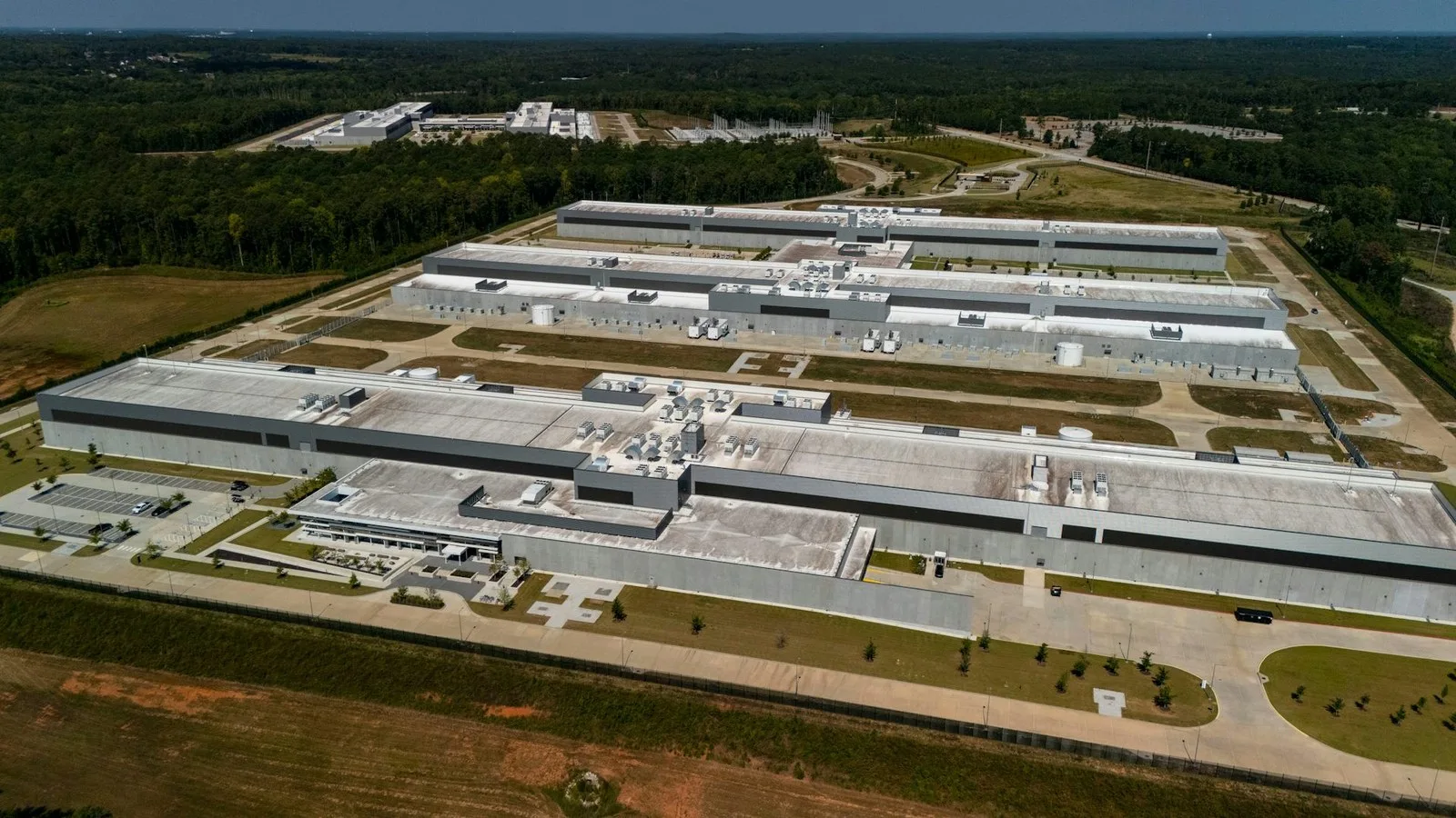 Data centers, like these near Social Circle, Ga., require enormous amounts of electricity. AP Photo/Mike Stewart, File