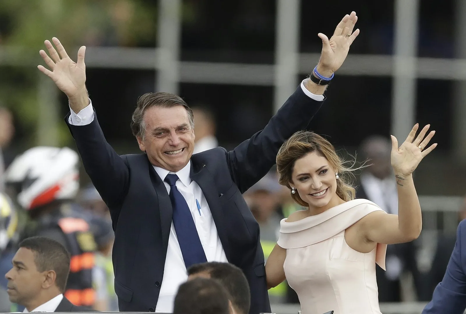 Michelle Bolsonaro, seen here in 2019 with her husband and then-President Jair Bolsonaro, was elected to her first public office this month. Andre Penner/AP