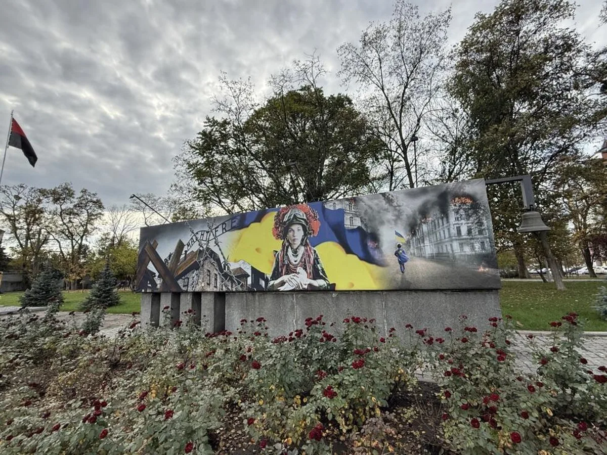 A mural located on the Alley of Glory in Pavlohrad, Ukraine. It features the inscription "Work sets you free", which stood above the entrance to the Auschwitz concentration camp. October 20, 2026