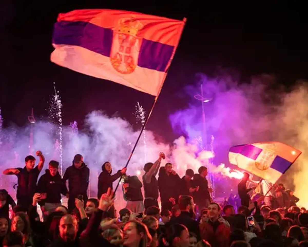 People celebrate the victory of the Student List in Belgrade, Serbia