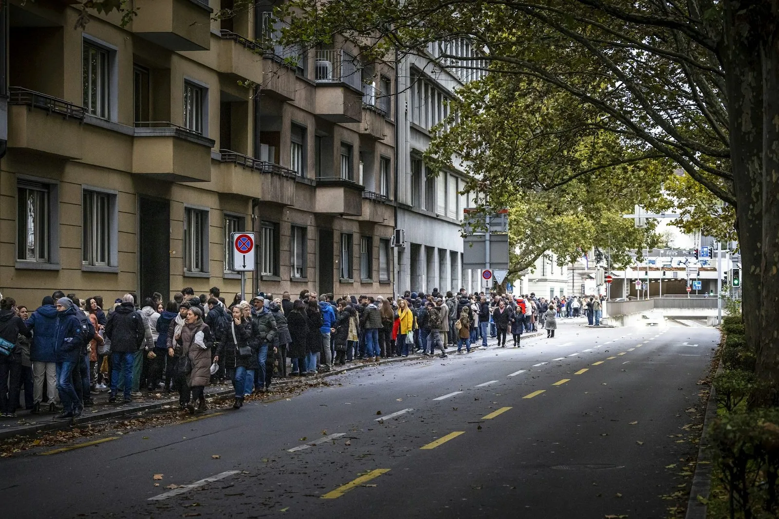 Serbian citizens queue outside the Serbian embassy in Zurich, Switzerland, to cast their ballots in the parliamentary elections. Michael Buholzer / EPA