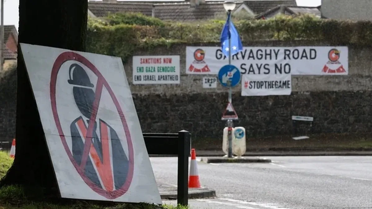 File photo dated 09/10/26 of posters at the Garvaghy Road in Portadown, Co Armagh. A narrow majority of people in Northern Ireland believe the Parades Commission was wrong to give the green light to the first Orange Order parade along the Garvaghy Road in almost 30 years, a poll has indicated. The r