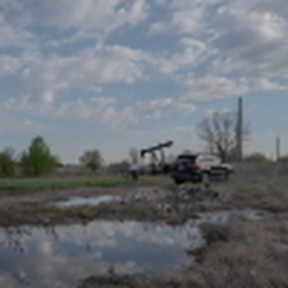 Scott Rabinowitz, President of Grand Resources, stands near a pump jack in Sperry, Oklah., on March 20, 2024.