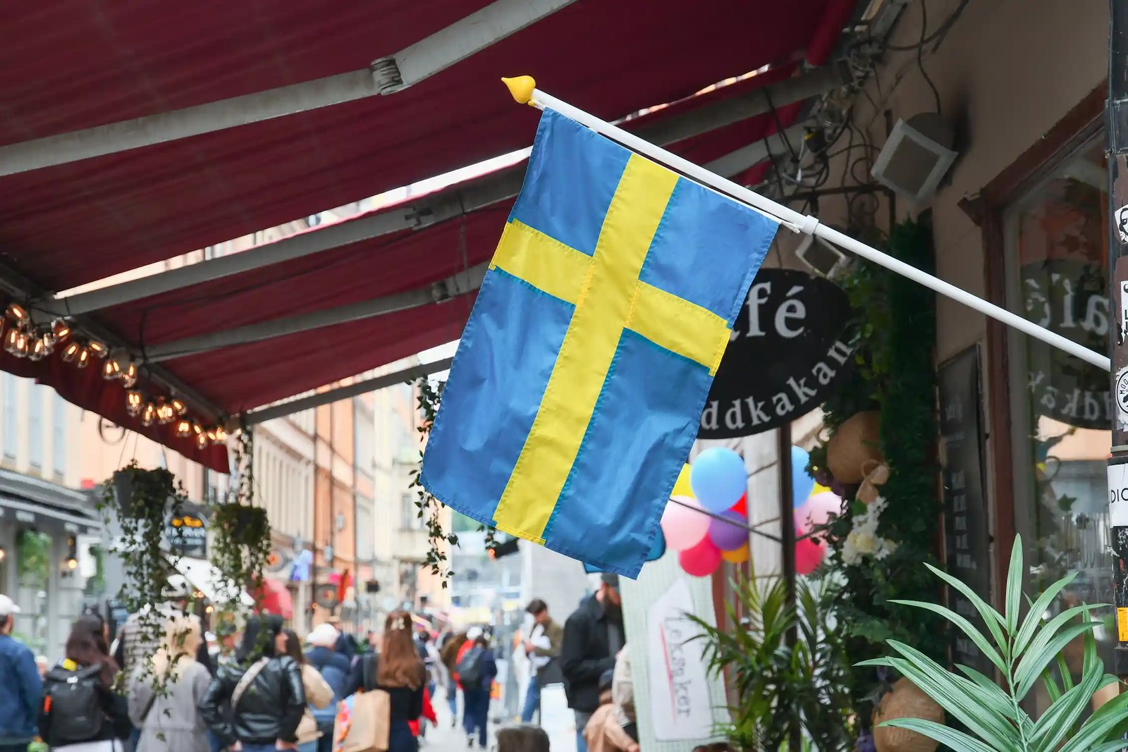 The Swedish flag on a street in Stockholm's old town.