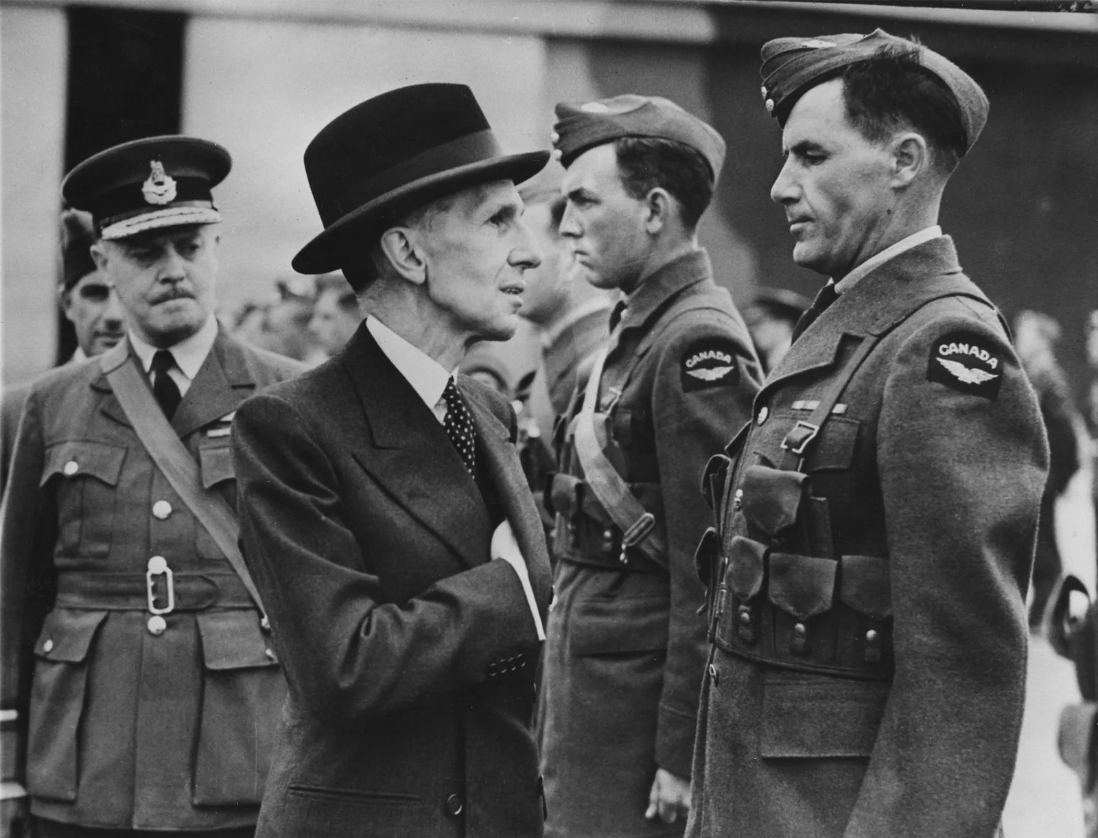 Vincent Massey, as Canadian High Commissioner in London, inspects Canadian airmen at Royal Air Force station in August 1940. (AP PHOTO)