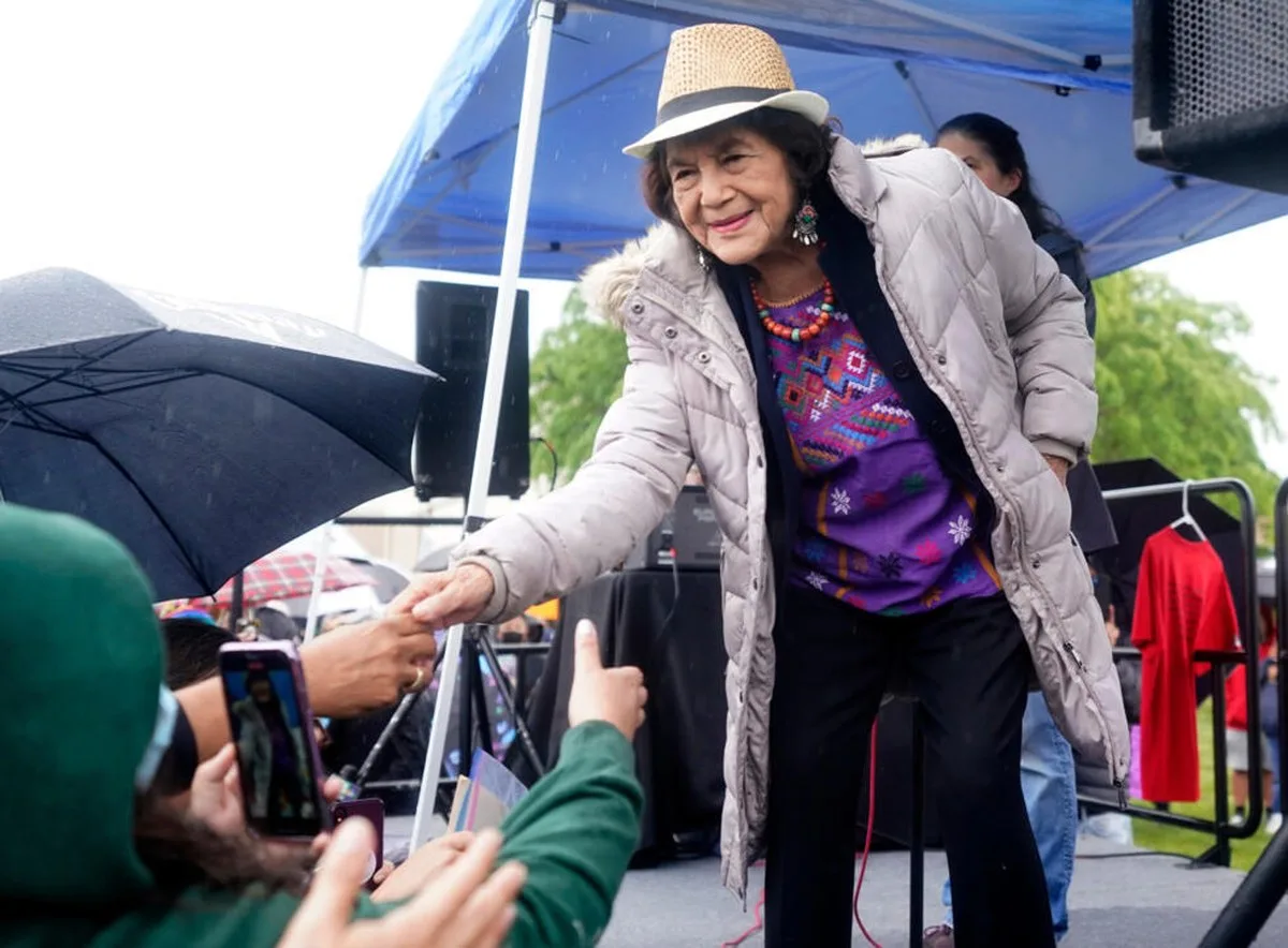 Labor activist Dolores Huerta shakes hands with people after addressing a rally held by teachers, parents, students and supporters of a strike against the Sacramento Unified School District at Rosemon