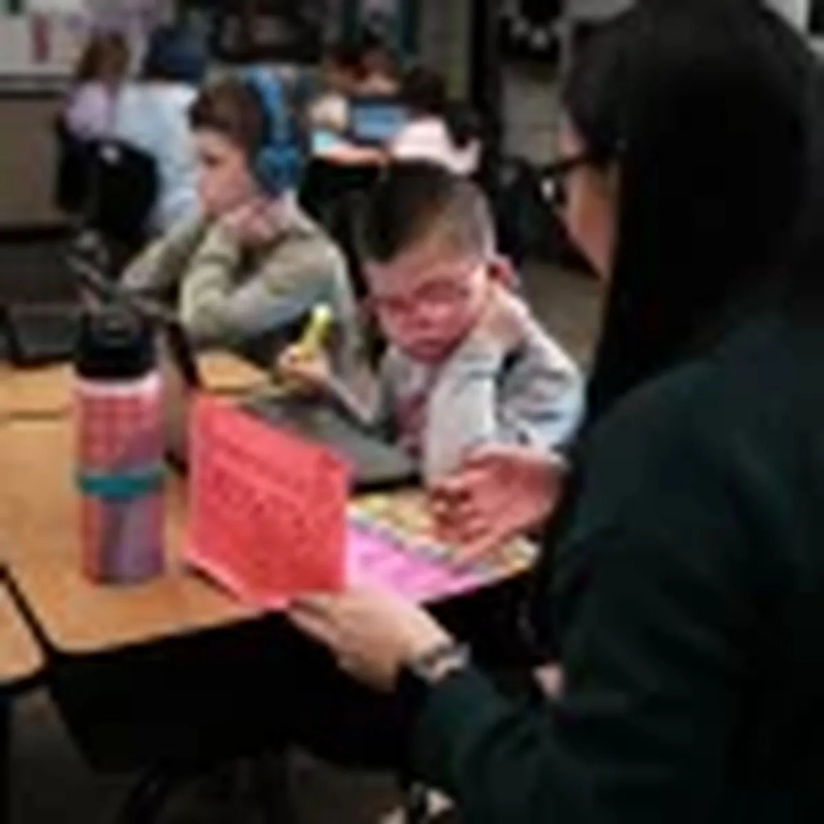 Kellen and his classmates, including his best friend, Nolan Robbins (left), learn about the structure of the U.S. government with teacher Robyn Fox.
