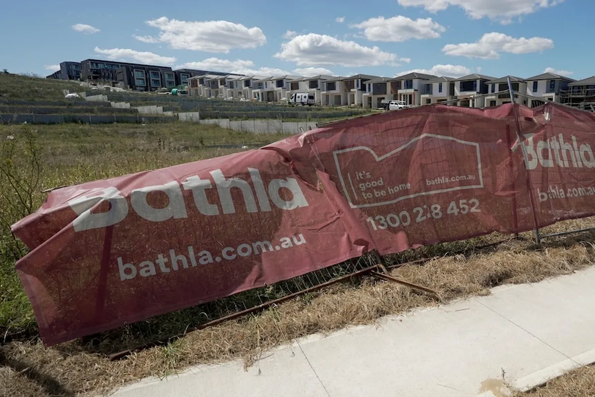 Canvas signage in front of suburban lots under development